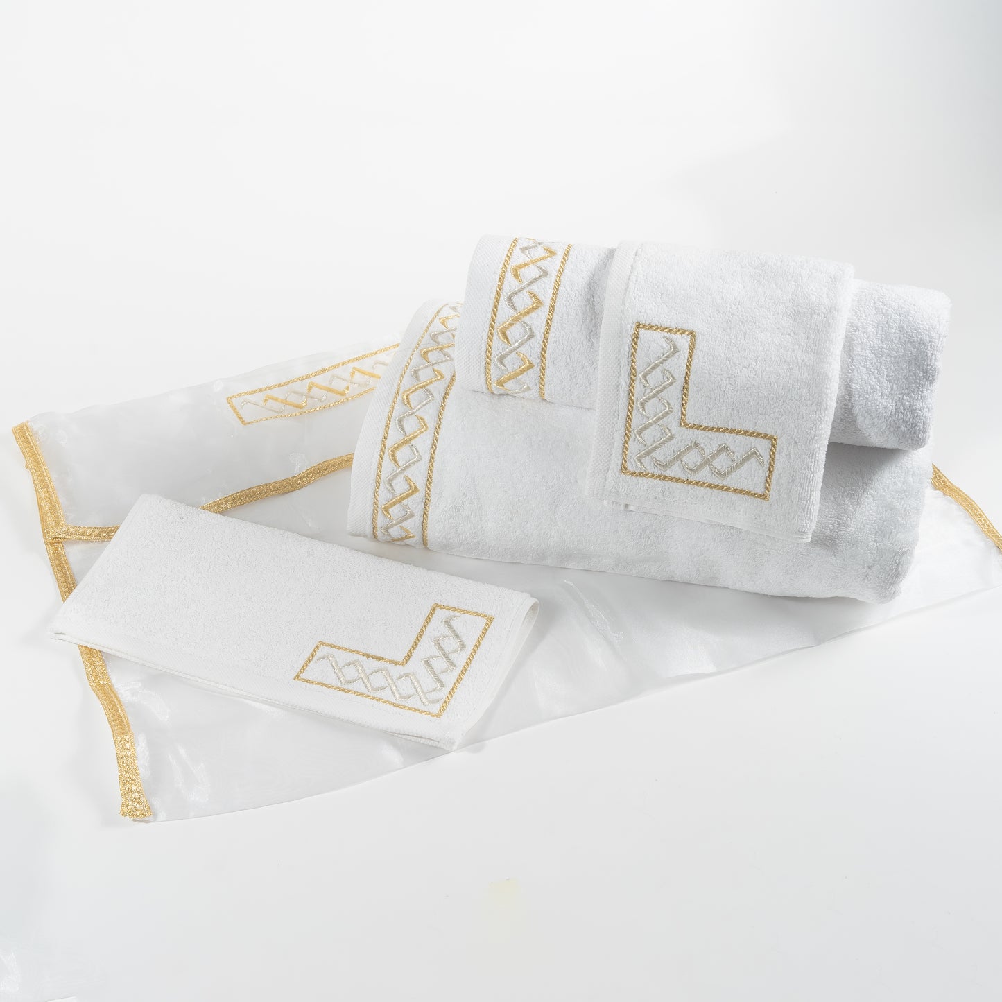 Pack de 4 serviettes brodées dans leur housse brodée 'Signature'