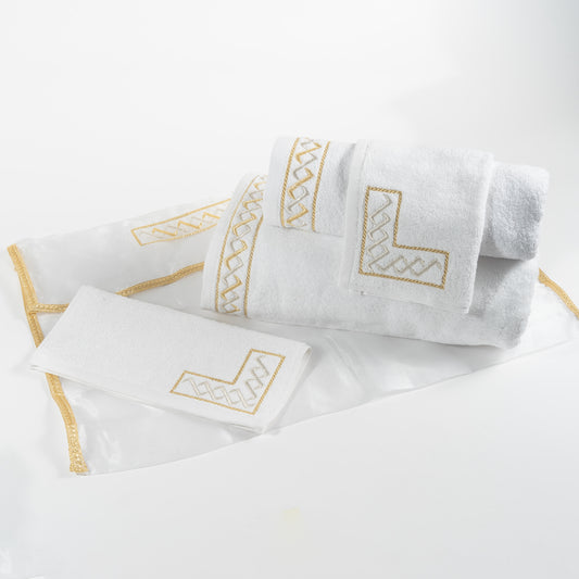 Pack de 4 serviettes brodées dans leur housse brodée 'Signature'